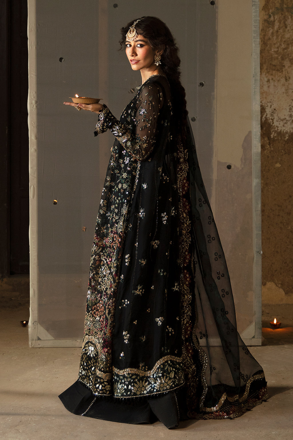 Afrozeh Hayat Wedding Formals 24 Meera – Black Pakistani Bridal Dress with intricate embroidery and embellishments. Shop elegant Asian dresses at Maria Faisal.