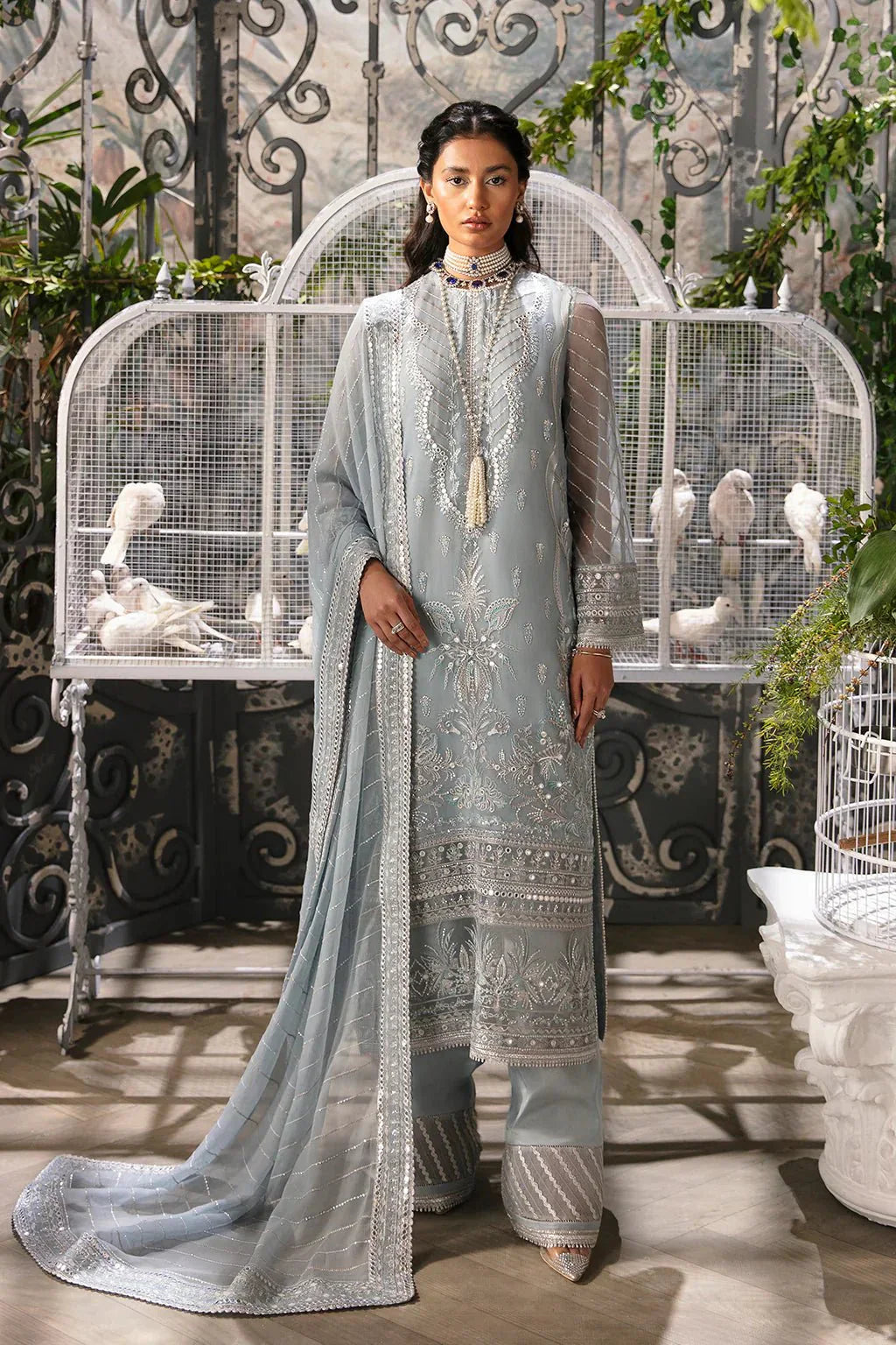 Afrozeh La Fuchsia 24 Caroline – Ice Blue Pakistani Bridal Dress with intricate embroidery and embellishments. Shop elegant Asian dresses at Maria Faisal.