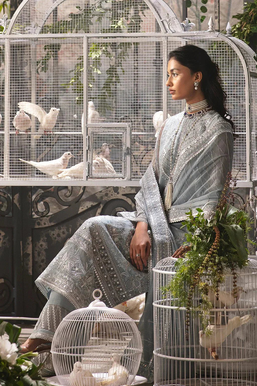 Afrozeh La Fuchsia 24 Caroline – Ice Blue Pakistani Bridal Dress with intricate embroidery and embellishments. Shop elegant Asian dresses at Maria Faisal.