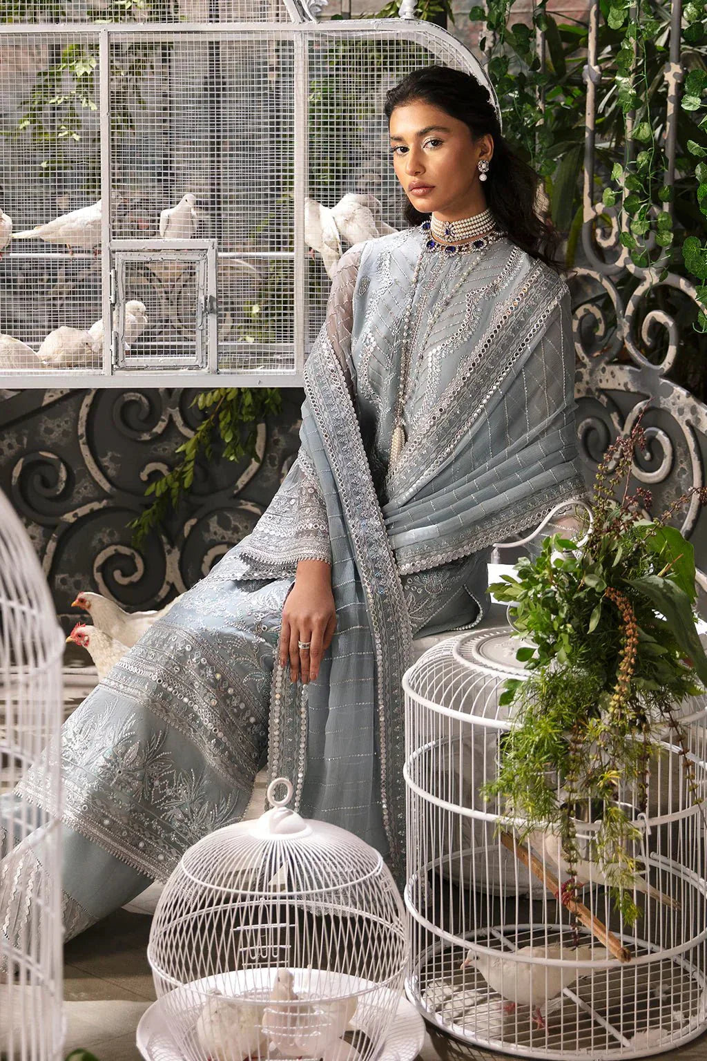 Afrozeh La Fuchsia 24 Caroline – Ice Blue Pakistani Bridal Dress with intricate embroidery and embellishments. Shop elegant Asian dresses at Maria Faisal.