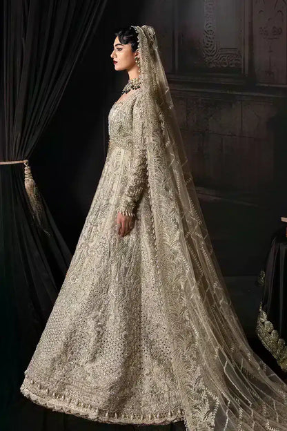 Afrozeh The Brides Edit 23 Margaret – Golden Pakistani Bridal Dress with intricate embroidery and embellishments. Shop elegant Asian dresses at Maria Faisal.