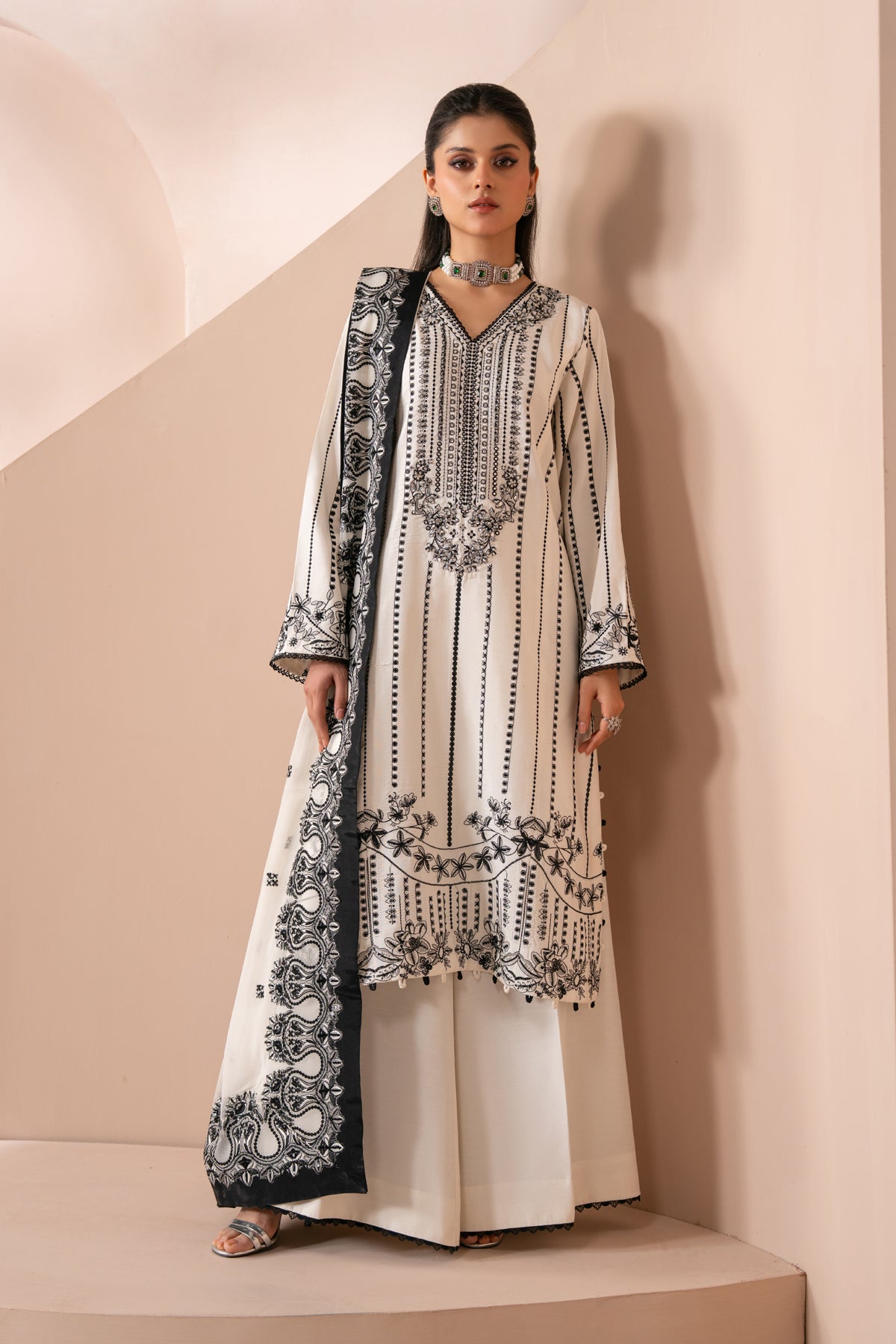 Xenia Formals | Zaeva Formals | OMAVI - Formal Dress - available at Maria Faisal in UK and USA.