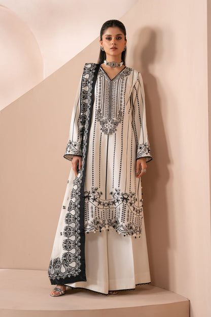 Xenia Formals | Zaeva Formals | OMAVI - Formal Dress - available at Maria Faisal in UK and USA.