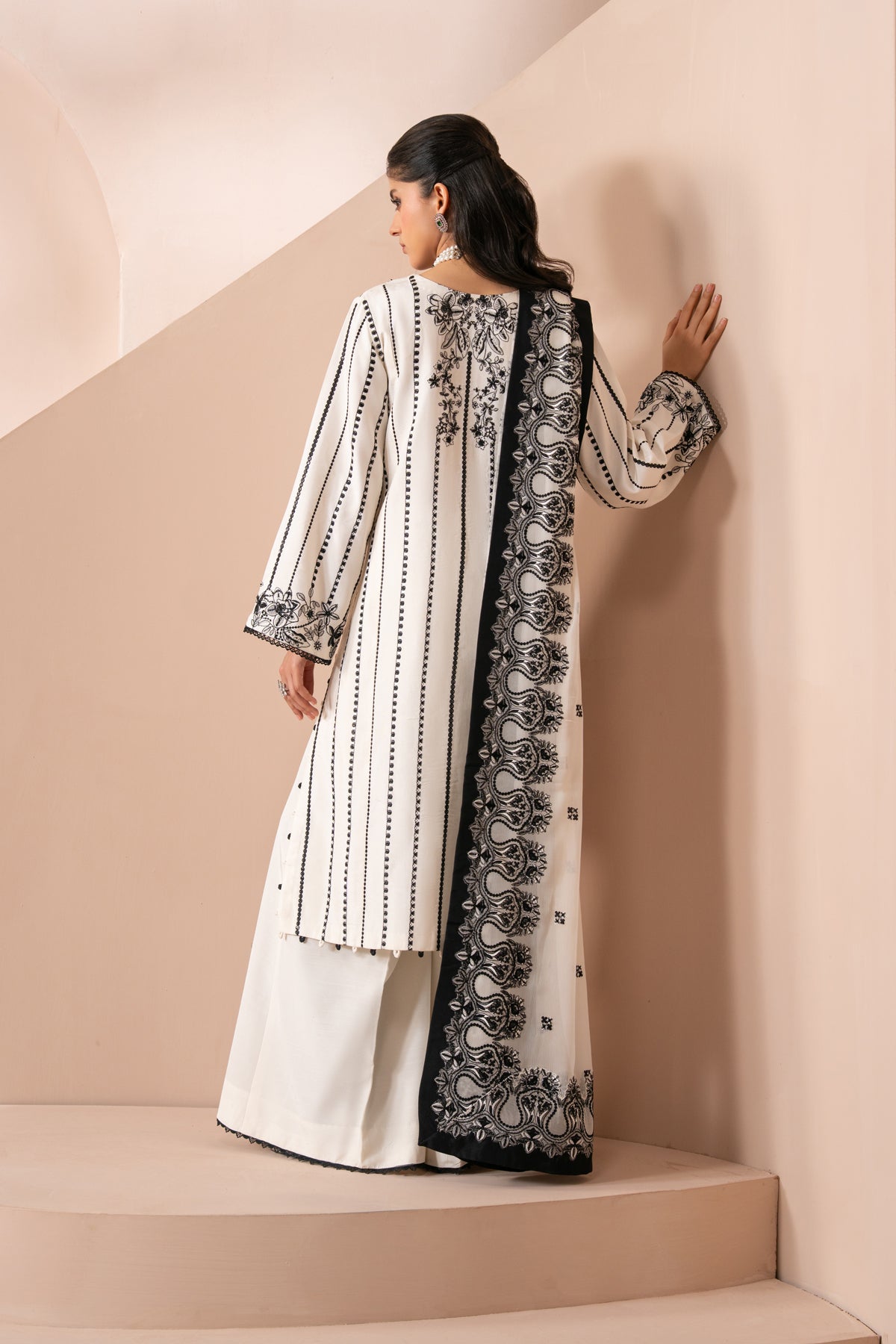 Xenia Formals | Zaeva Formals | OMAVI - Formal Dress - available at Maria Faisal in UK and USA.