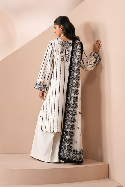 Xenia Formals | Zaeva Formals | OMAVI - Formal Dress - available at Maria Faisal in UK and USA.