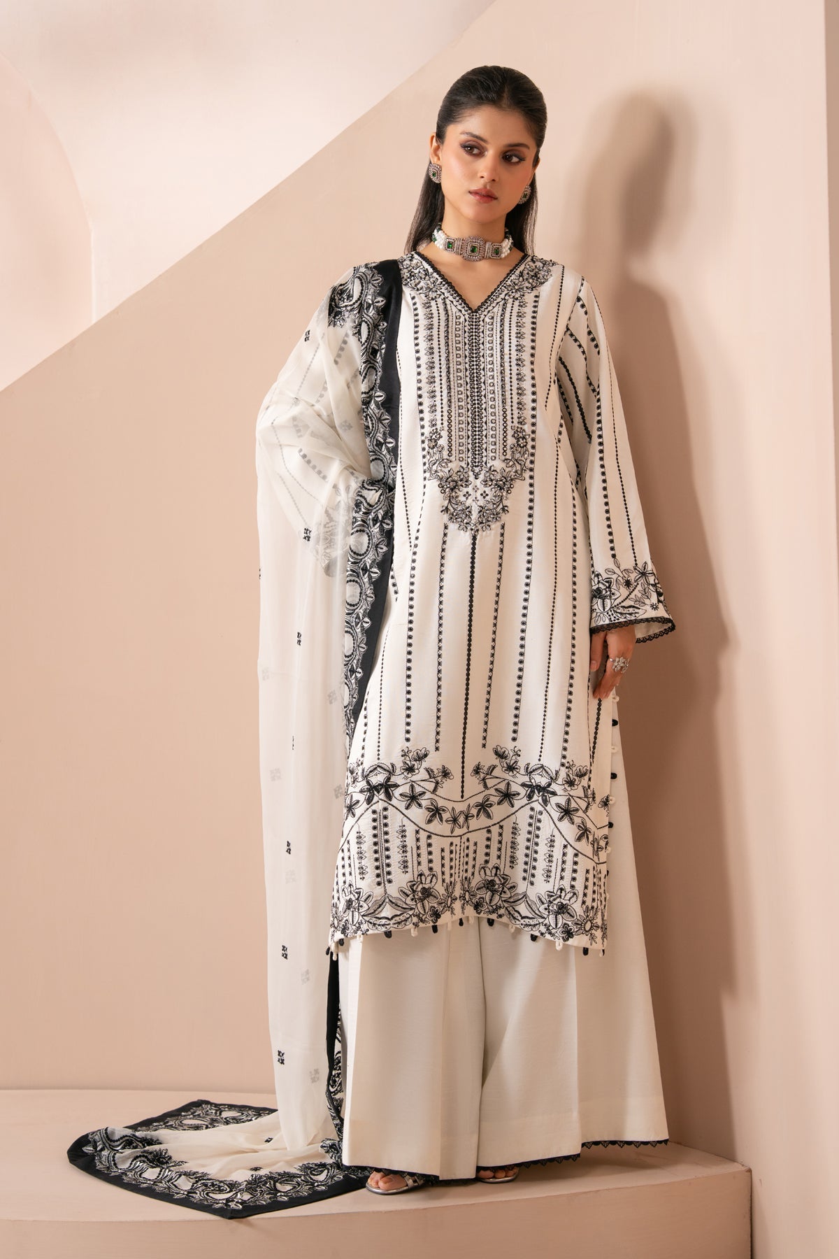 Xenia Formals | Zaeva Formals | OMAVI - Formal Dress - available at Maria Faisal in UK and USA.