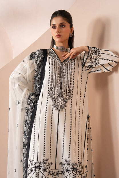 Xenia Formals | Zaeva Formals | OMAVI - Formal Dress - available at Maria Faisal in UK and USA.