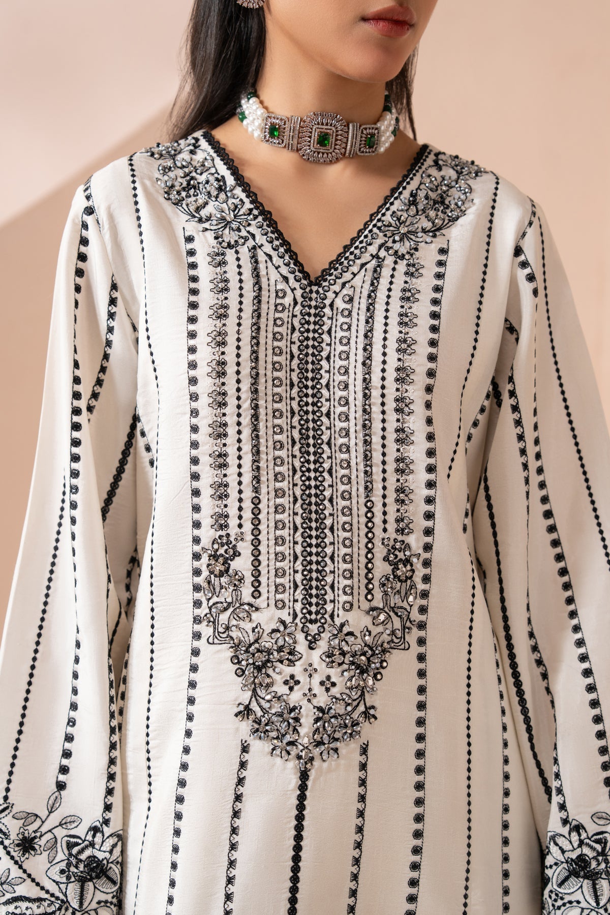 Xenia Formals | Zaeva Formals | OMAVI - Formal Dress - available at Maria Faisal in UK and USA.