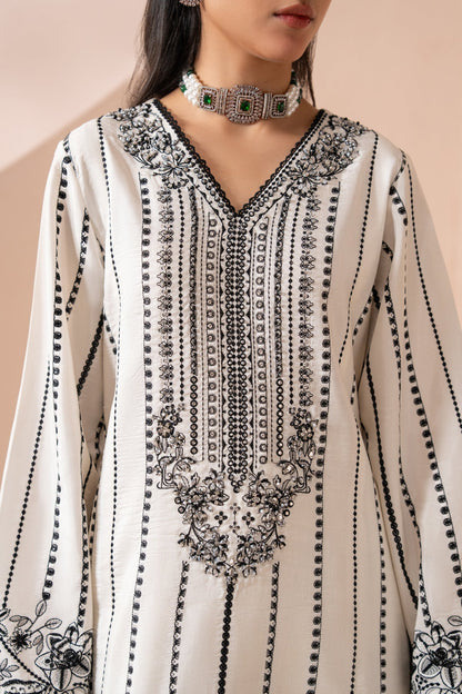 Xenia Formals | Zaeva Formals | OMAVI - Formal Dress - available at Maria Faisal in UK and USA.