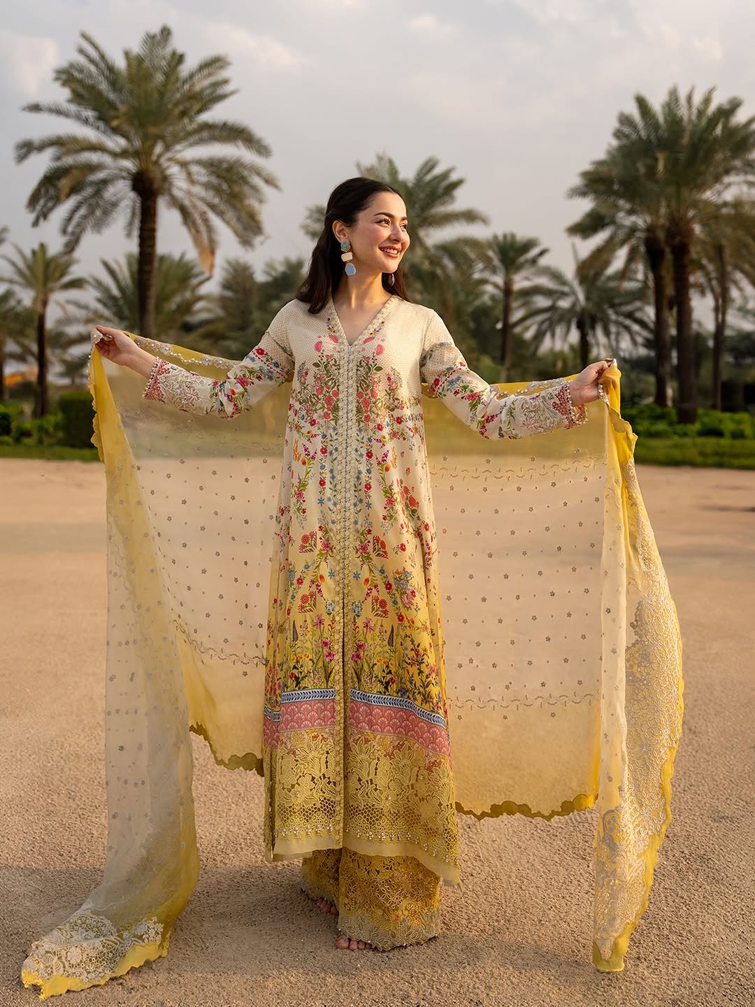 Hania Amir Wearing Yellow Mustard Dress Arta from Faiza Saqlain Aya Luxury Lawn - Front look - Available for women in UK and USA. 