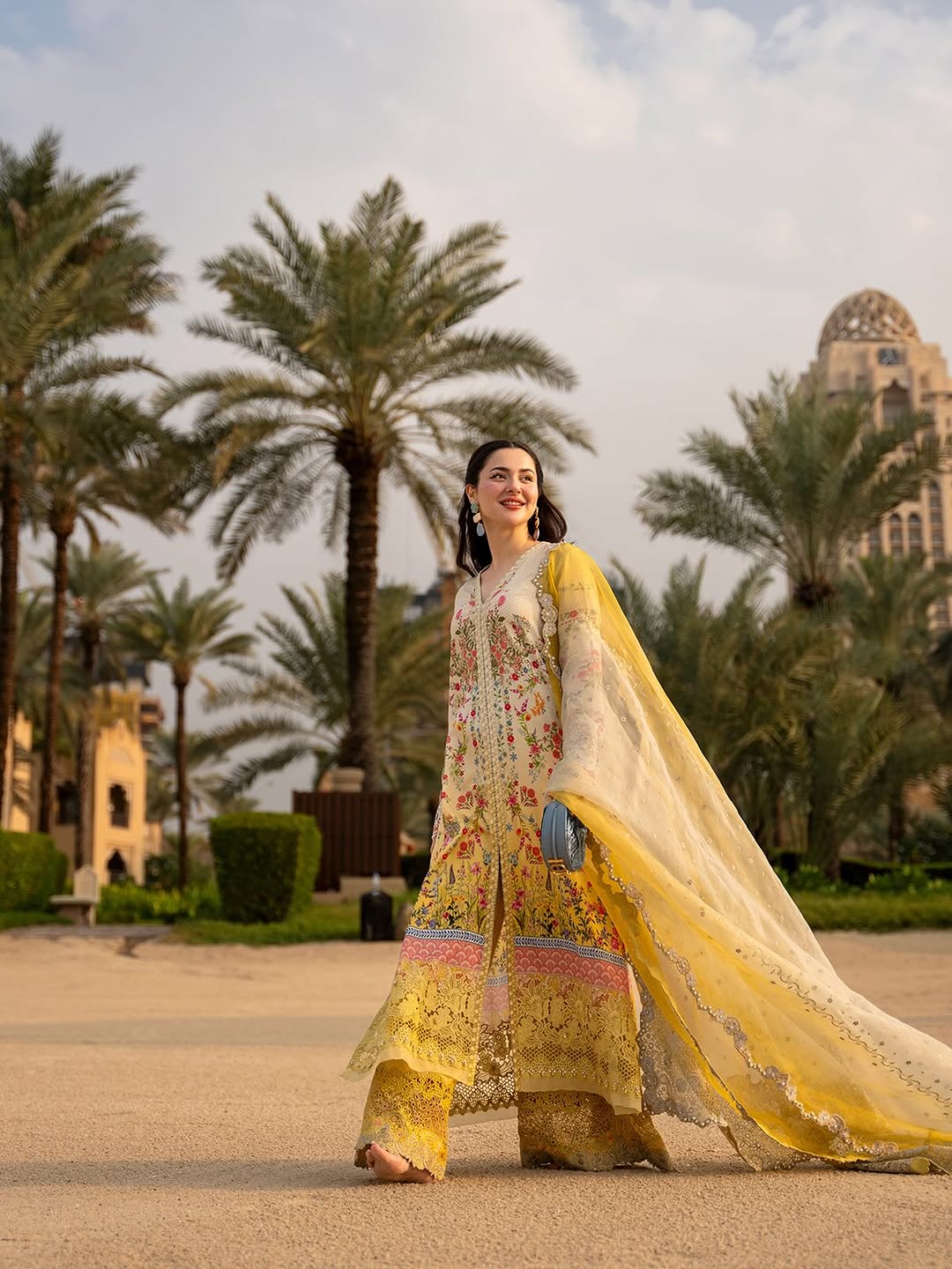 Hania Amir Wearing Yellow Mustard Dress Arta from Faiza Saqlain Aya Luxury Lawn - Side look - Available for women in UK and USA. 