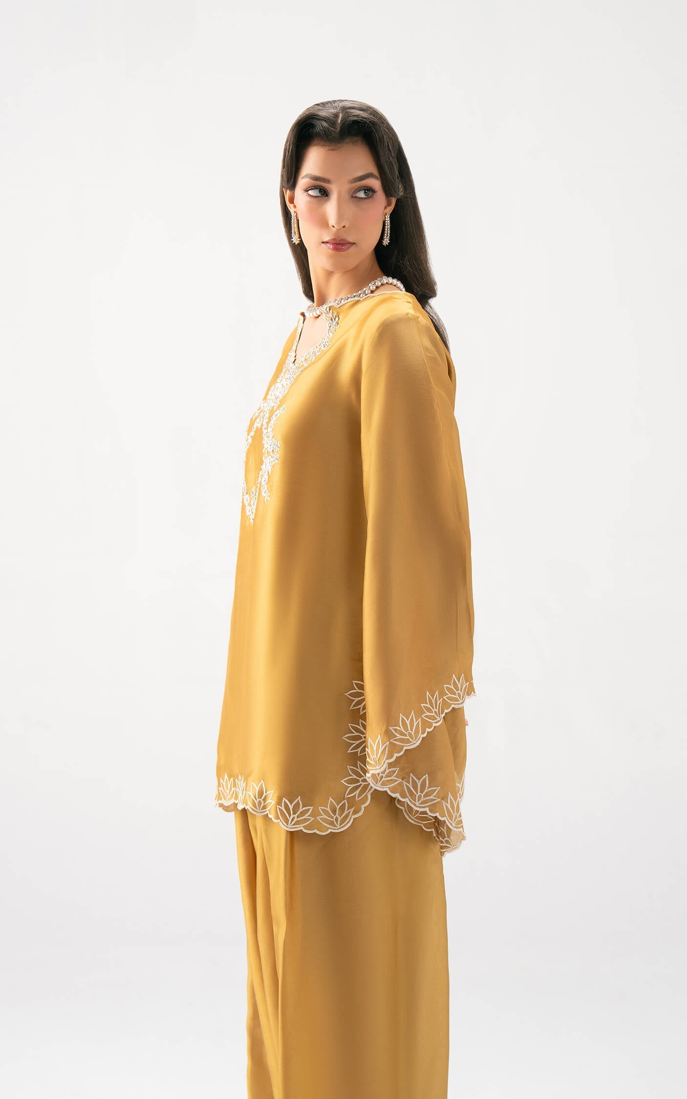 Asifa and Nabeel | Celevara Luxe | Golden Reverie - Luxury Dress - available at Maria Faisal in UK and USA.