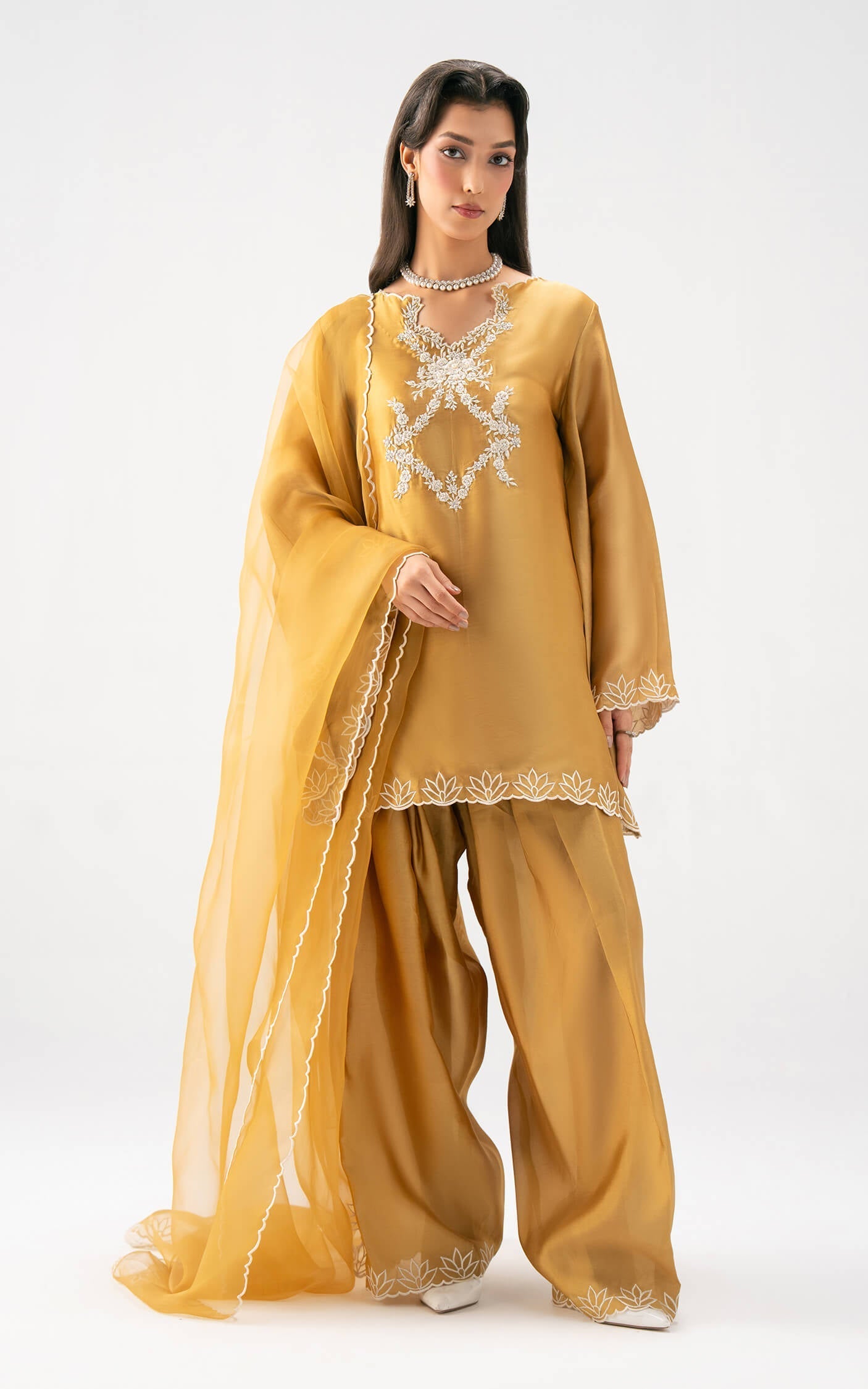 Asifa and Nabeel | Celevara Luxe | Golden Reverie - Luxury Dress - available at Maria Faisal in UK and USA.