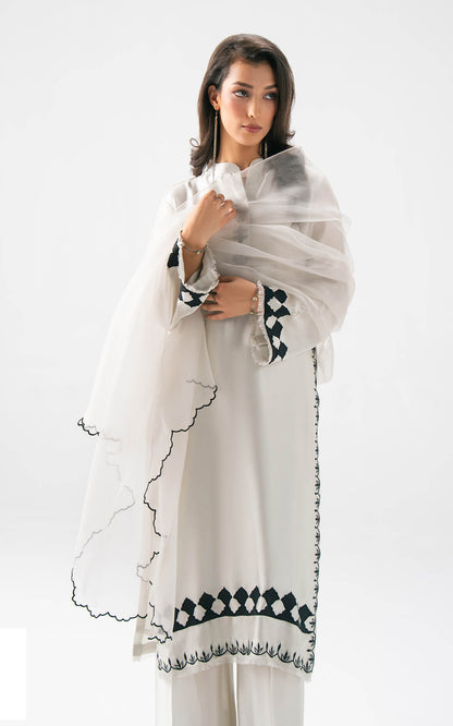 Asifa and Nabeel | Celevara Luxe | Grace Serenity - Luxury Dress - available at Maria Faisal in UK and USA.