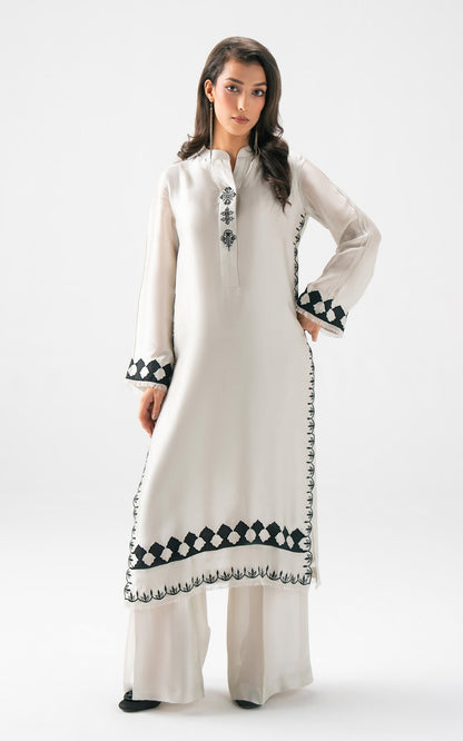 Asifa and Nabeel | Celevara Luxe | Grace Serenity - Luxury Dress - available at Maria Faisal in UK and USA.