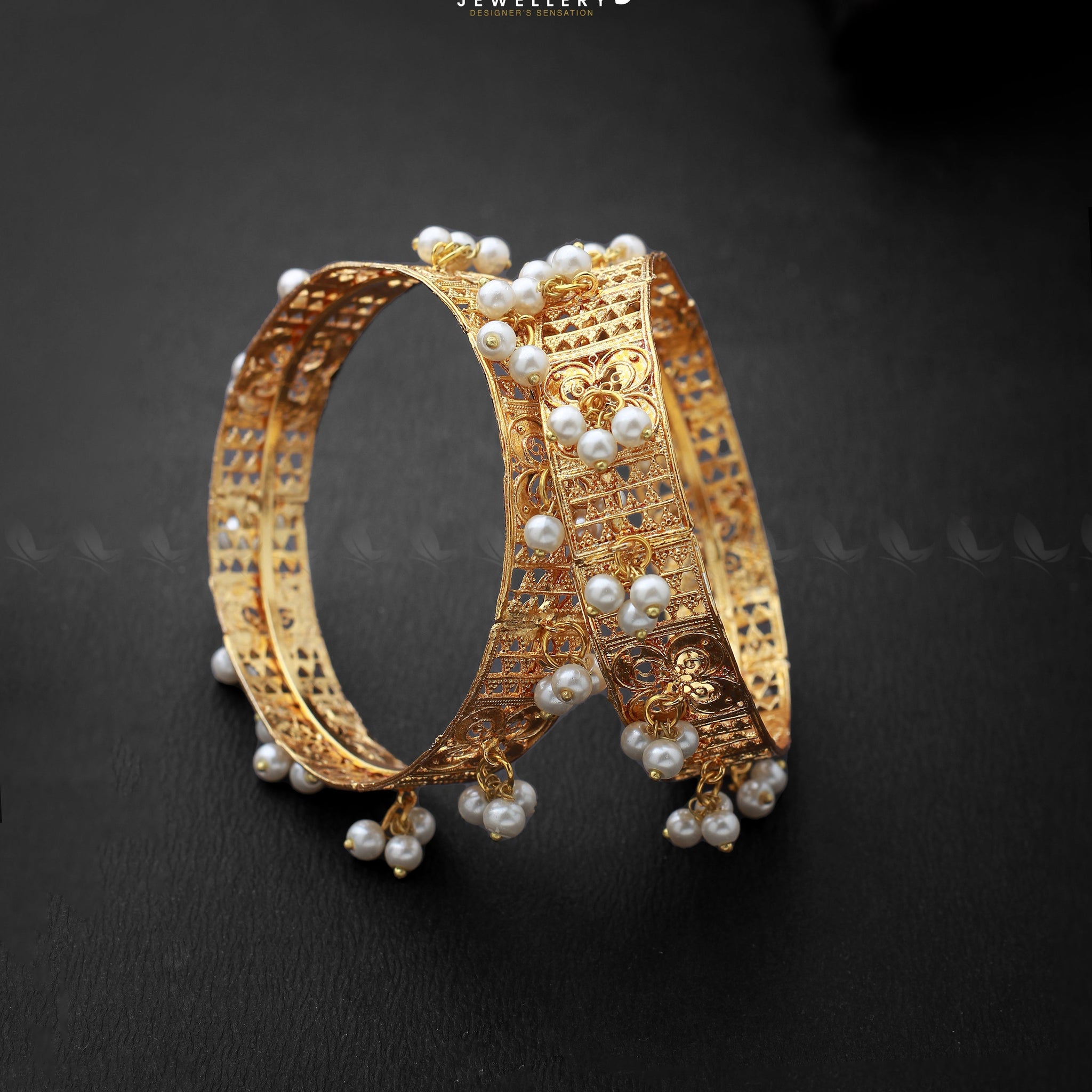 Traditinal Kara Bangles - Designer Dress with Intricate embroidery and embellishments. Shop elegent wedding dress at Maria Faisal.