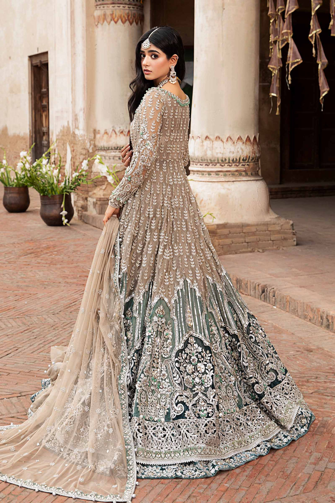 Maria B | Bridal Couture | Mehrinoz - Designer Dress with Intricate embroidery and embellishments. Shop elegent wedding dress at Maria Faisal.