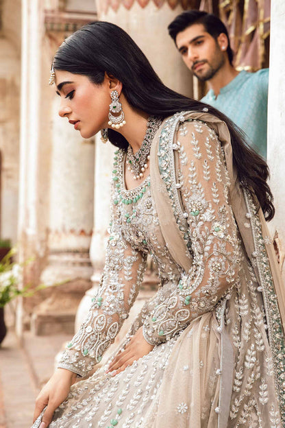 Maria B | Bridal Couture | Mehrinoz - Designer Dress with Intricate embroidery and embellishments. Shop elegent wedding dress at Maria Faisal.