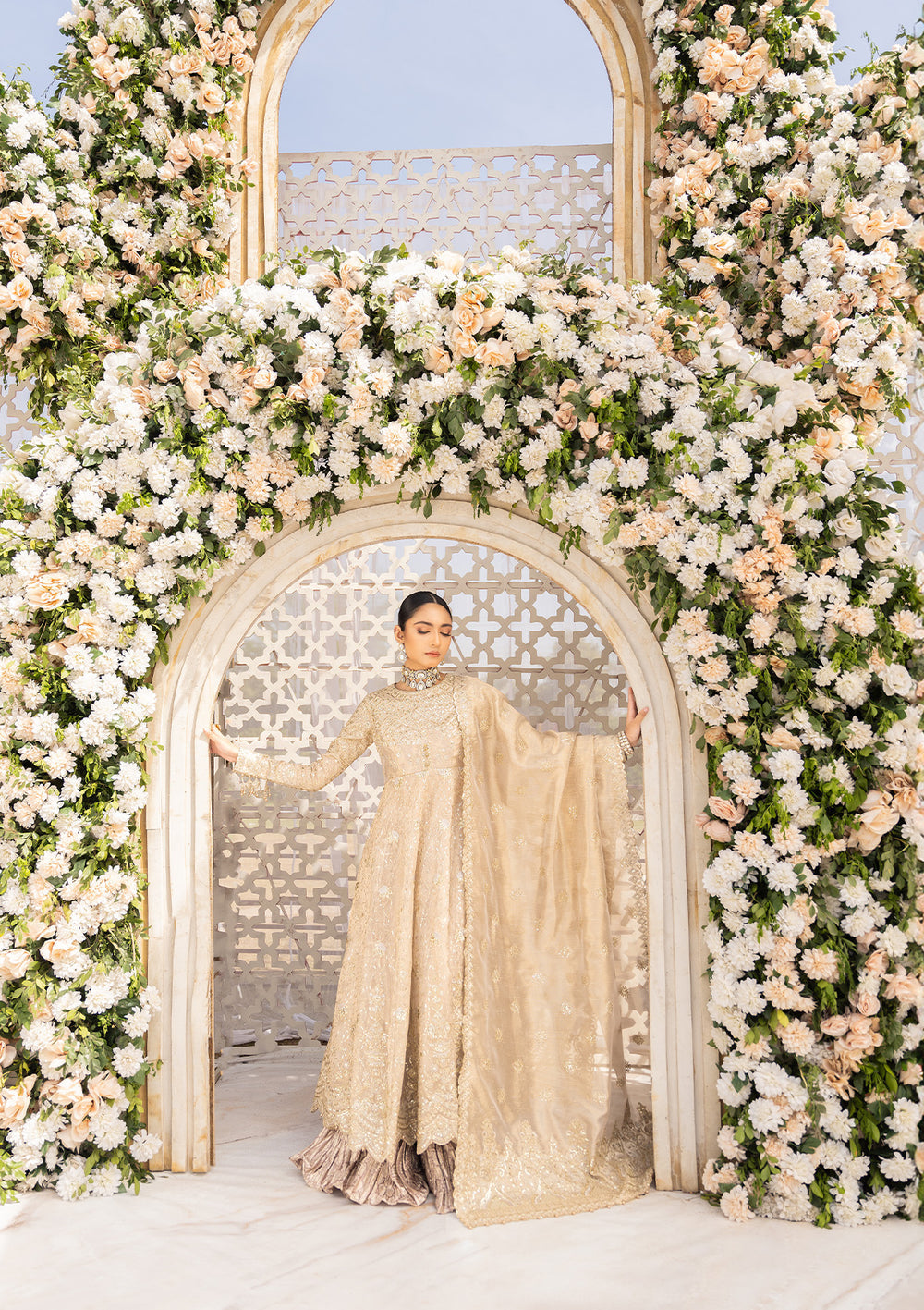 Aik Atelier Formals Vol-1 24 Look 6 - Light Gold Pakistani Dress with intricate embroidery and embellishments. Shop elegant Asian dresses at Maria Faisal.