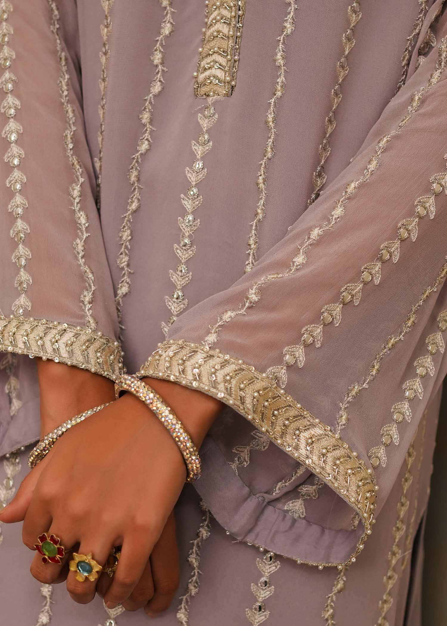 Mahgul | Eid Edit 2024 | Lavender Lines - Designer Dress with Intricate embroidery and embellishments. Shop elegent wedding dress at Maria Faisal.
