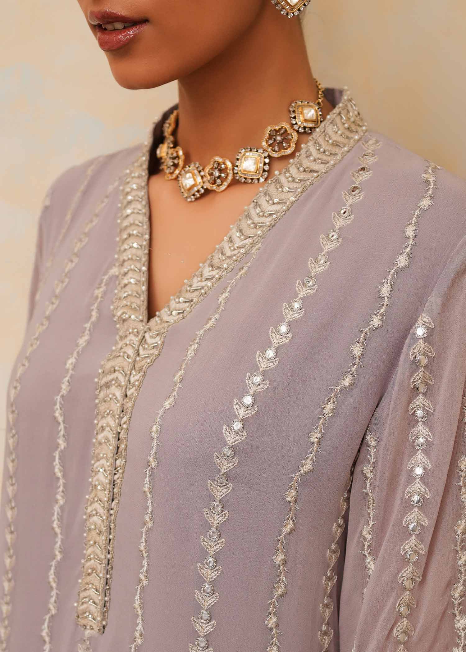 Mahgul | Eid Edit 2024 | Lavender Lines - Designer Dress with Intricate embroidery and embellishments. Shop elegent wedding dress at Maria Faisal.