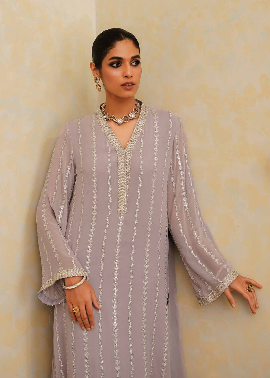 Mahgul | Eid Edit 2024 | Lavender Lines - Designer Dress with Intricate embroidery and embellishments. Shop elegent wedding dress at Maria Faisal.